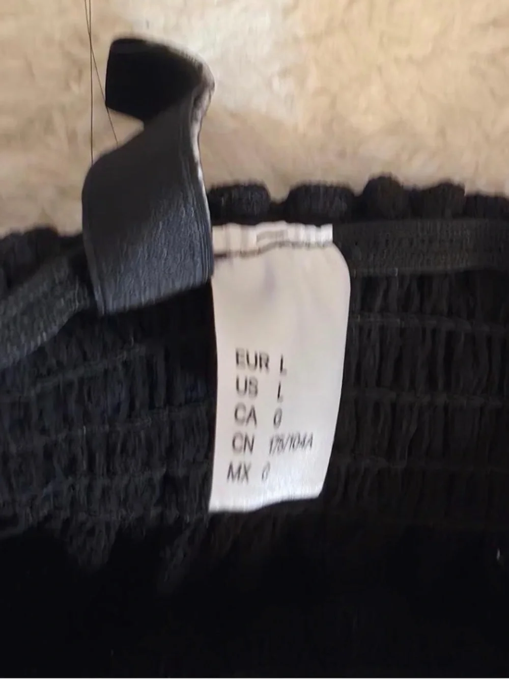 H&M women’s black off the shoulder long sleeve blouse. Size large.